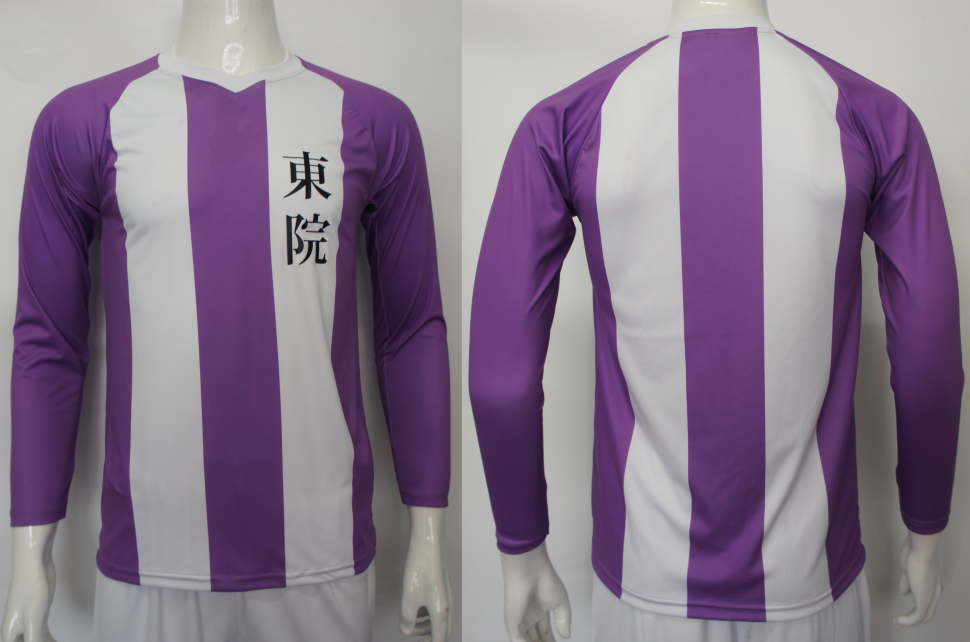 白と紫のストライプ柄のVネック、ラグラン長袖のサッカーシャツ