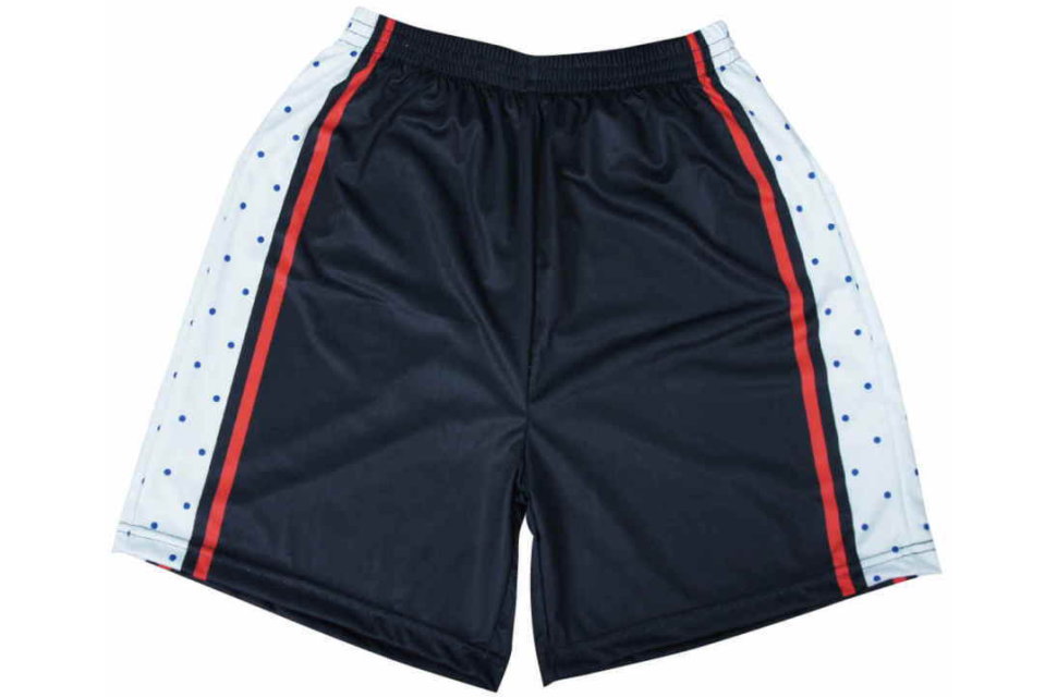 セットアップのサッカーパンツ前面。シャツと連動したサイドのドット柄と赤ラインが特徴のオーダーメイド昇華プリントパンツ。